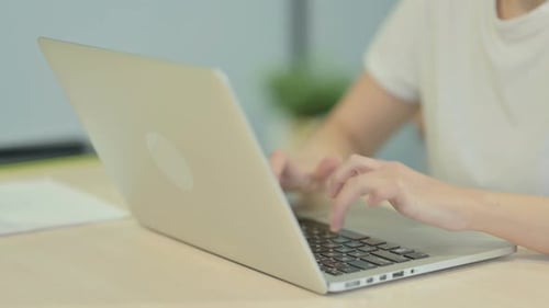 Close up of Woman Typing on Laptop