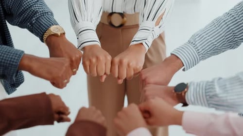 Business, unity or hands of people with fist bump for team building, office community or solidarity