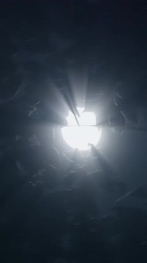 A Mysterious Light Emanating From a Chasm in the Vast Dark Endless Space Beyond Us