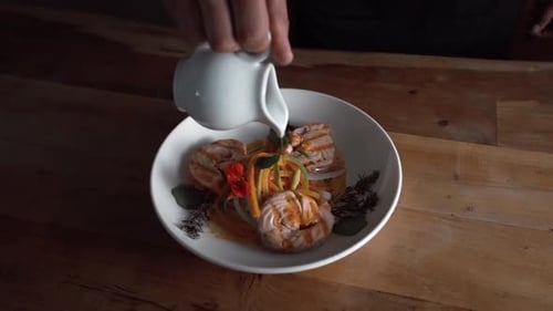 A plate featuring succulent grilled salmon fillet, perfectly complemented by a medley of finely chop