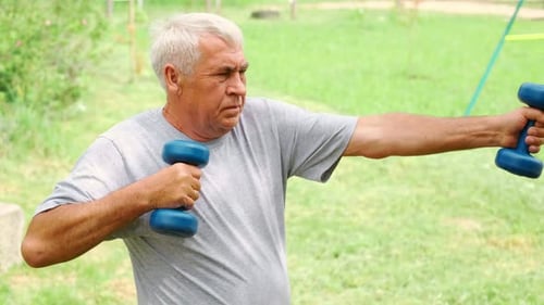 Senior Man Working Out Outdoors Person Lifting Dumbbells Old Male Exercising at Park Healthy People