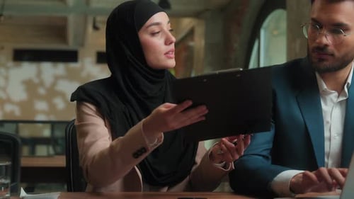 Arabian Woman Girl Muslim Hijab Businesswoman Employee Assistant Write Document in Office Indian Man