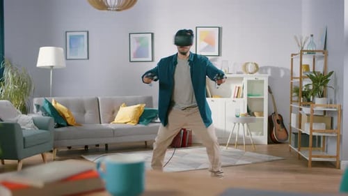 Young Man Using Virtual Reality Headset at Home