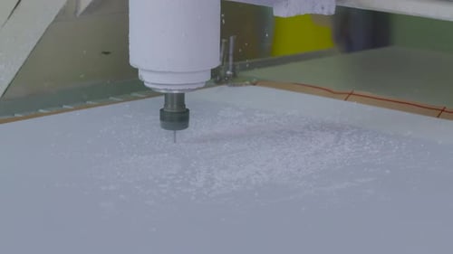 Industrial Factory concept, Cutting CNC tool is carving plastic workshop on plant. Automatic system