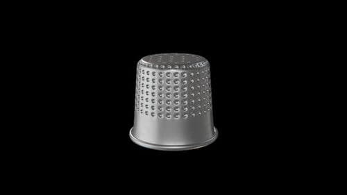 Seamless Loop of a Spinning Silver Thimble