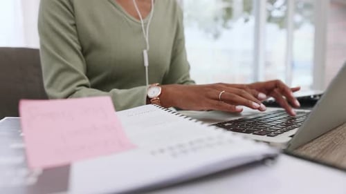 Business person typing email on laptop, hands of secretary doing corporate proposal
