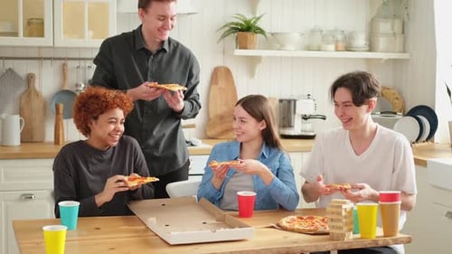 Home Party Overjoyed Diverse Friends Eating Ordered Pizza for Home Party Happy Group Mixed Race
