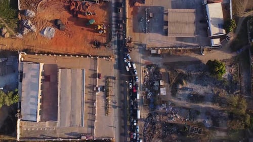 traffic jam and traffic slowly merging and driving forward in Abuja, the capital city of Nigeria