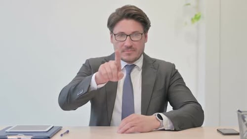 Portrait of Rejecting Middle Aged Businessman Doing No Gesture in Office