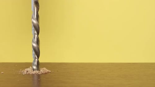 Drill Bit Making a Hole in Wood