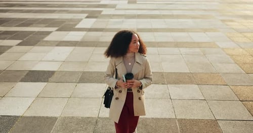 Business, woman and walking on sidewalk in city, cbd and urban travel to office building