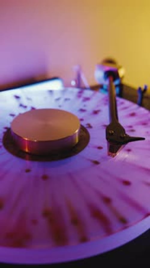 Close Up of Vinyl Record Spinning on Turntable