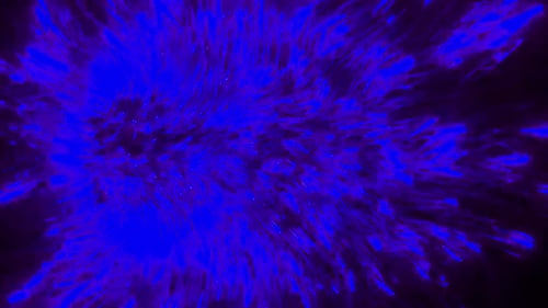 Lebendiges blaues Licht explodiert in der Dunkelheit