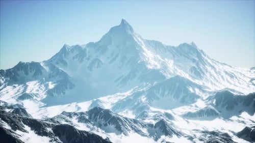 Majestic Snow Capped Mountain Range Aerial Pan