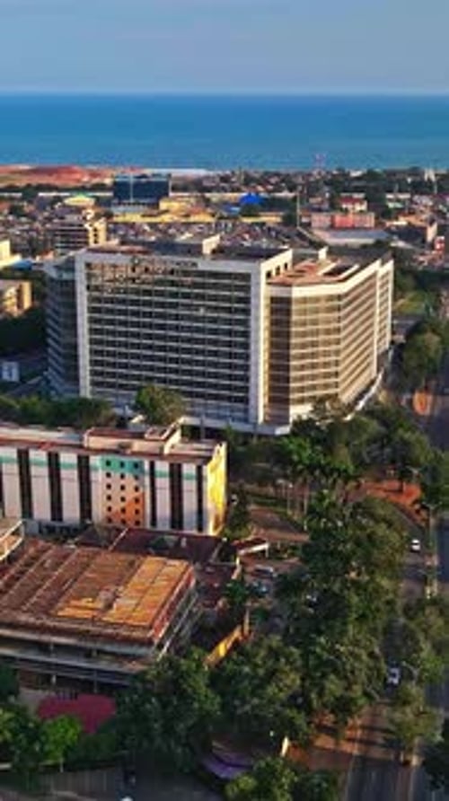 Aerial view of Accra showcasing urban landscape and coastal horizon