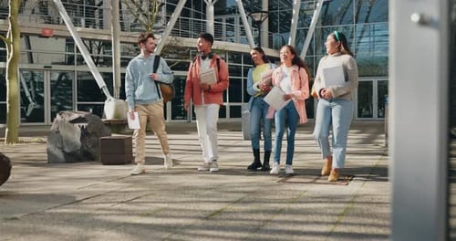 University, diversity and students walking on campus for education together in a corridor as friends