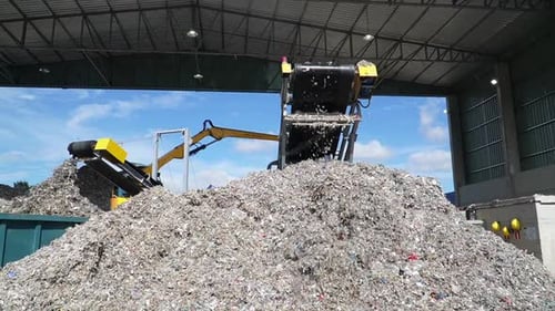 Witness the recycling process: footage captures the in action inside the recycling factory.