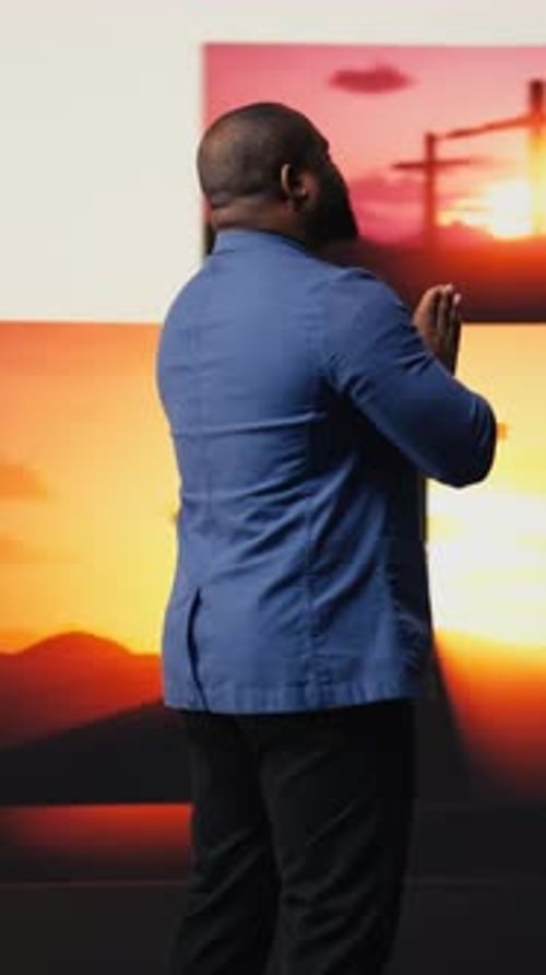 Vertical Video Devoted Male Worshipper Praying in Silence Embodying Serenity and Inner Peace