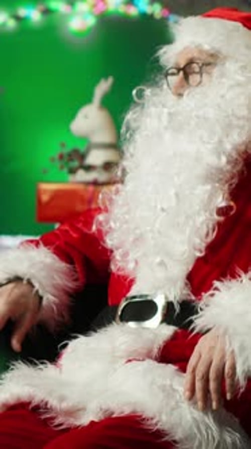 Vertical Video Santa Claus Surprised By Christmas Miracle After Finding Gift in Workshop