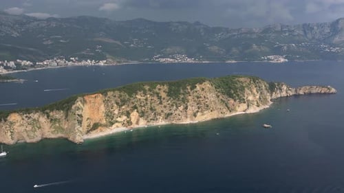 Beautiful rocky island in the middle of the sea. Montenegro. Aerial view.
