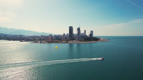 Resort Town Batumi. Batumi Aerial. Tourists Speed Boat With Parachute