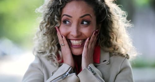 Woman Expressing Shock and Surprise Outdoors Close-Up