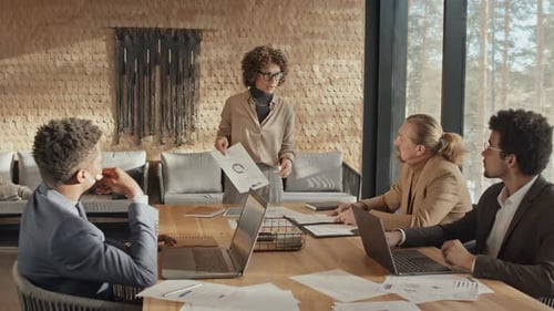 Business Professionals Collaborate During a Workplace Meeting