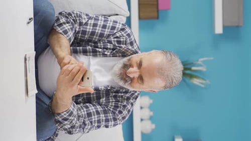 Mature Man Video Calling Using Mobile Phone