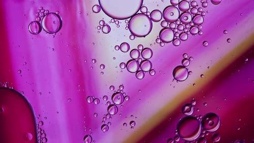 Colorful Oil Bubbles Moving On A Water Surface 069