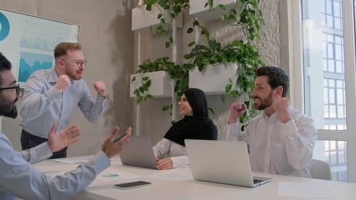 Diverse Team Celebrates Workplace Success