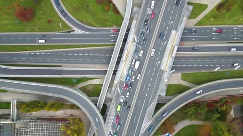 Aerial shot of elevated road junction. Drone footage of top view of Highway road junctions. The Inte