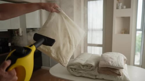 Steaming Pillowcase with a Handheld Steam Cleaner