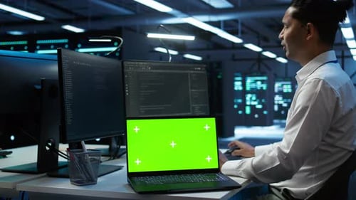 Expert in Server Room Coding on Chroma Key Notebook