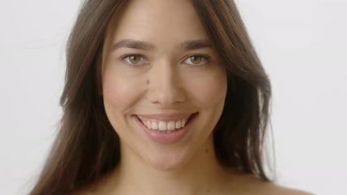Beautiful Woman Smiling on White Background, Close Up
