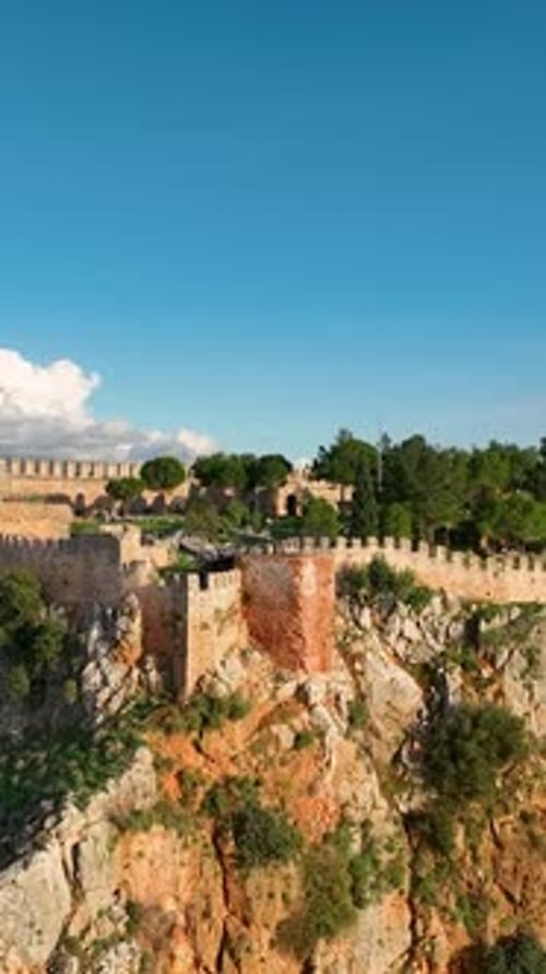 Vertical Video Aerial View of the Ancient Fortress on the Mediterranean Coast in Alanya Turkey