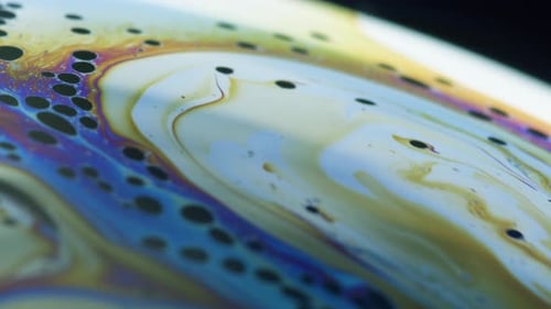 Dinâmica de fluidos e difração de refração de luz na superfície da bolha de sabão de perto