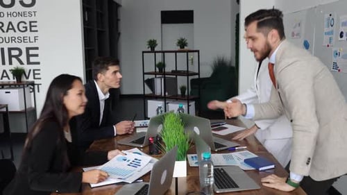 Discussion and Conclusion of a Deal Between Two Companies Employees Shaking Hands Agreeing on the