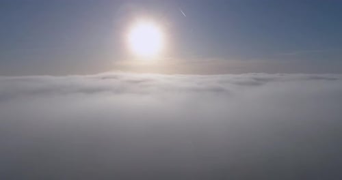 Aerial View of Clouds with Sun Shining