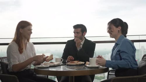 White collar worker meeting at high rise tower.