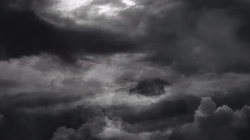 several lightning bolts in dark clouds