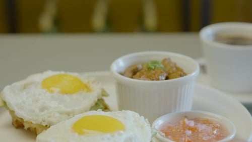 Close up of breakfast food and coffee indoors