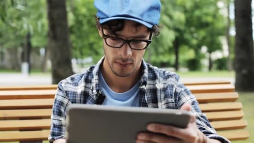 Leisure, Technology, Communication and People Concept - Creative Man with Tablet Pc