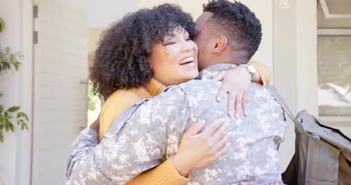 Soldier Returns Home to Loving Family