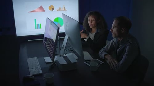 Engaging in Collaborative Data Analysis Within a Dimly Lit Office Environment Setting