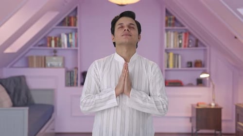 Religious Indian man praying to God