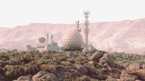 Military Base Surrounded By Mountains with Communication Towers and Radar Dome