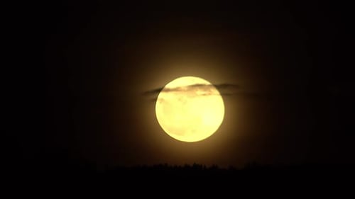 Glowing Full Moon in the Dark Night Sky