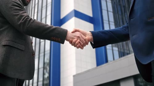 Two Business Man in Suit Shaking Hands Greeting Making Deal Informal Meeting Downtown Outdoor