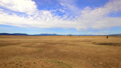 Aerial View of Oregon Landscape and Mountains Under Blue Sky 2 Above