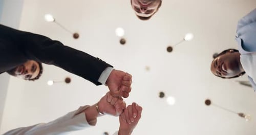 Fist bump, solidarity and hands of business people in office for teamwork